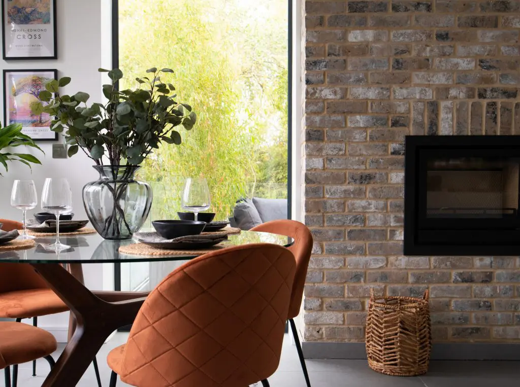 Interiors shot designeed by Alix Stoney of Amberley Studio featuring round table and chairs.